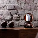 artemide-eclisse-tischleuchte-copper-closeup.webp
